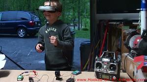 My son wearing Foxtech Video Goggles